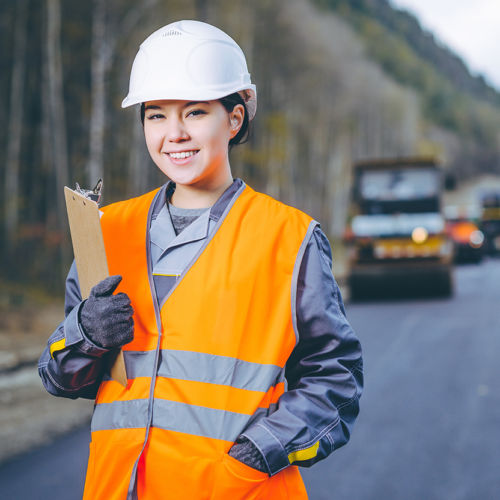female construction worker with hard hat on